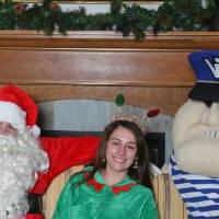 Louie and santa with elf